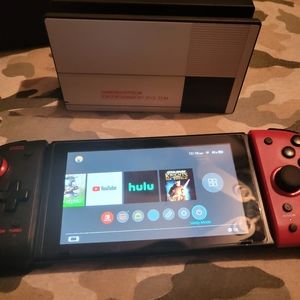 Nintendo switch Grey joy cons. With pro style joy cons. 2 pro controller etc...